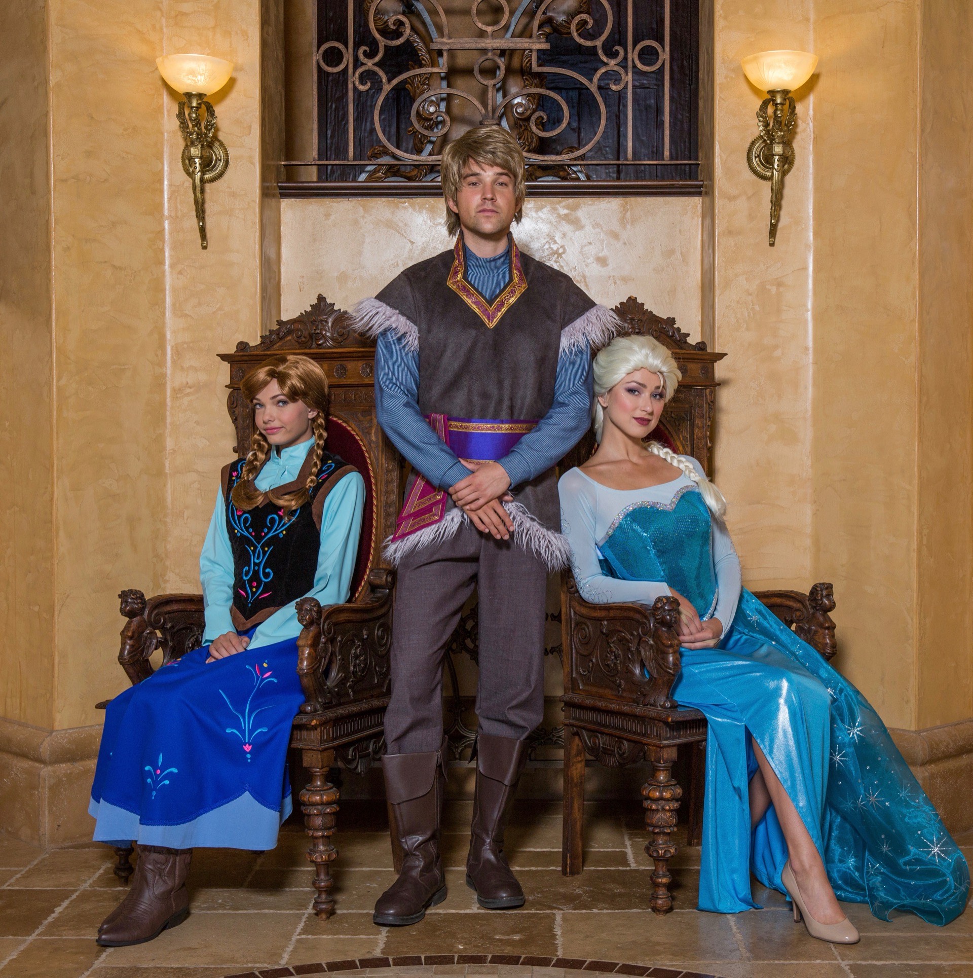 Frozen characters Anna, Elsa, and Kristoff at a corporate family event