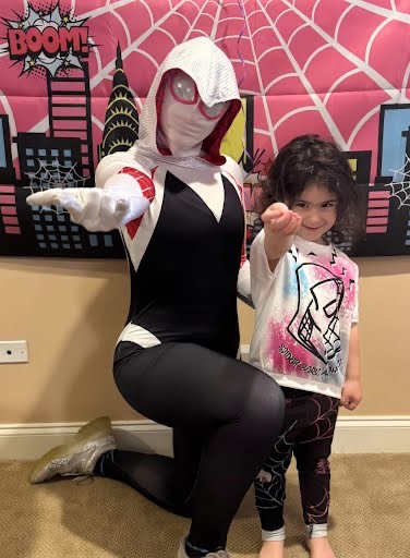 Hire Ghost Spider Spider-Gwen for birthday parties - Spider-Verse superhero character performer in white pink and black suit