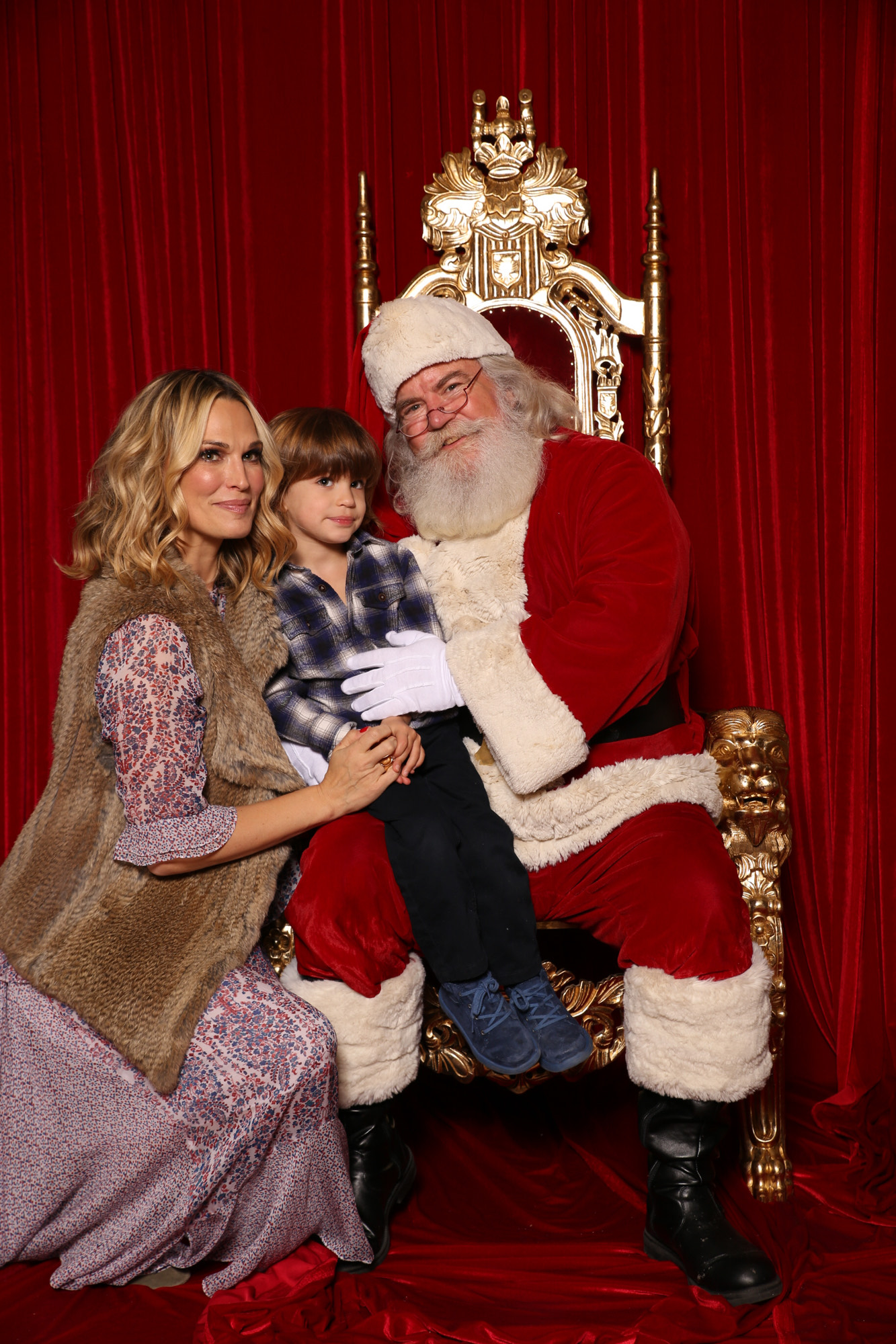 Santa Claus with children at holiday party