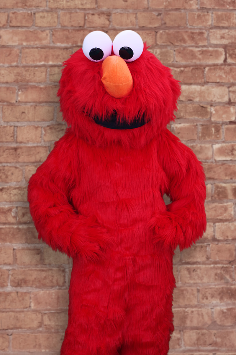 Elmo character at birthday party